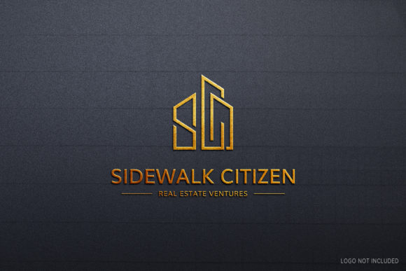 Gold Logo Mockup Design in Black Wall: A Powerful Branding Statement